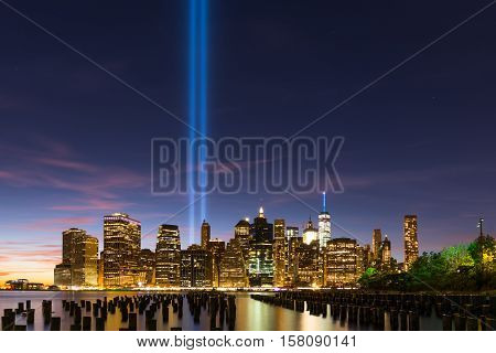 Lower Manhattan on the 15th aniversary of September eleventh. Beans of light Tribute. Taken from across the river in Brooklyn.