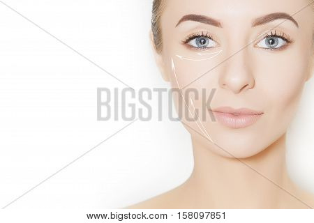 Closeup of female adult with marks on skin for cosmetic medical procedures
