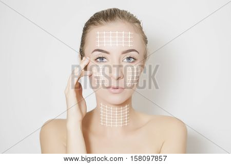 Closeup of female adult with marks on skin for cosmetic medical procedures