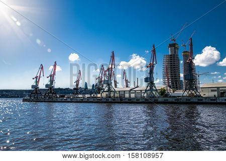 Sea trading port. Port cranes and cargo ships. Baku , Azerbeijan, Europe.
