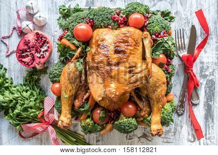 Roasted Chicken With Vegetables On The Christmas Table