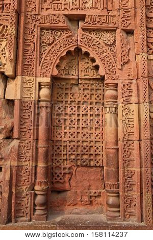 DELHI, INDIA - FEBRUARY 13 : Stone carving on Qutab Minar, Delhi, India on February 13, 2016.