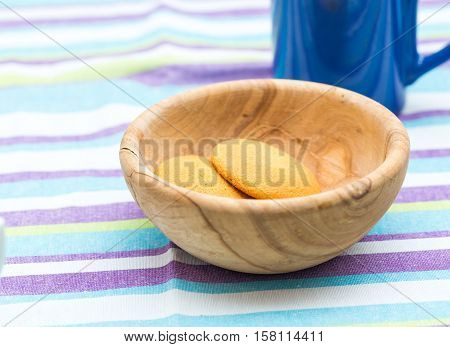 Biscuits Cakes In Wooden Bowl On Table