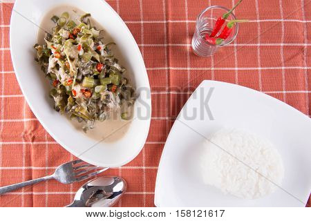 chopped legumes and winged beans in bagoong sauce