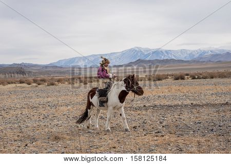 Beautiful Mongolian Girl Traditionally Wearing Typical Mongolian Fox Dress Culture Of Mongolia. She