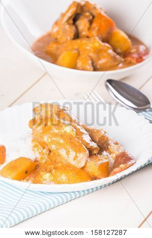 chicken with tomato sauce with carrots and potatoes also known as chicken caldereta