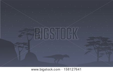 Silhouette of mapusaurus with tree scenery collection stock