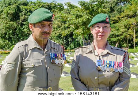 Labuan,Malaysia-Nov 11,2012:Soldiers in uniform for the remembrance Day at Commonwealth World War II in Labuan,Malaysia.Remembrance Day in Borneo will be observed at Labuan World War II Memorial park.