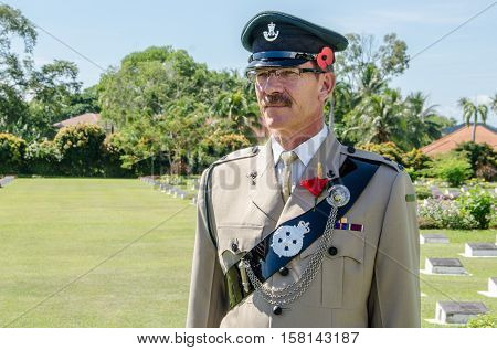 Labuan,Malaysia-Nov 11,2012:Soldiers in uniform for the remembrance Day at Commonwealth World War II in Labuan,Malaysia.Remembrance Day in Borneo will be observed at Labuan World War II Memorial park.