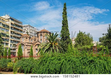 View of green garden and Church of Panagia Chalkeon in Thessaloniki. Greece Europe