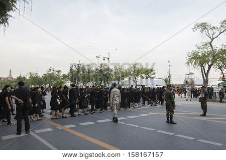 BANGKOK THAILAND - NOV 22 : moving of mourners line up on Ratchadamnoen Nai road in sanam luang area for into Grand Palace while the funeral of king Bhumibol Adulyadej on november 22 2016
