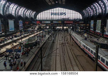 HAMBURG GERMANY - JULY 18 2015: Hauptbahnhof in Hamburg Germany. It is the main railway station in the city the busiest in the country and the second busiest in Europe.