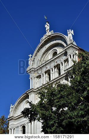 Saint Zechariah beautiful renaissance church facade rises above trees in Venice