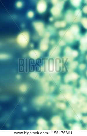 abstract background with bokeh defocused lights and stars. Boke twinkling Lights Festive holiday party background with blurry special magic effect.