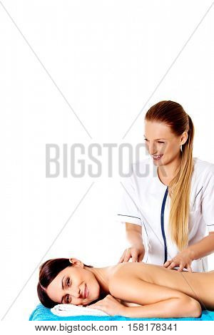 Woman having massage of body in the spa salon. Beauty treatment concept.