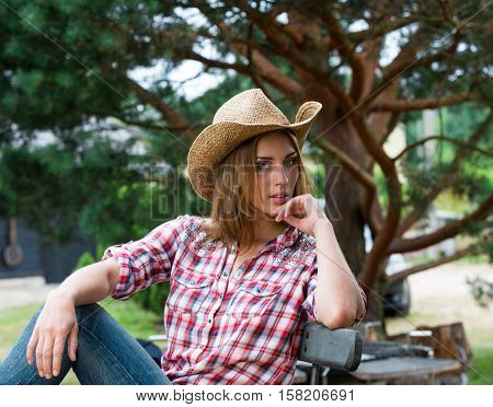 Young Cowgirl In Hat