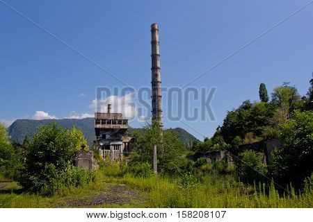 Abandoned, destroyed by war and overgrown  Tkvarcheli (Tquarchal) power plant, Abkhazia, Georgia