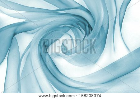 closeup of wavy organza fabric in blue color