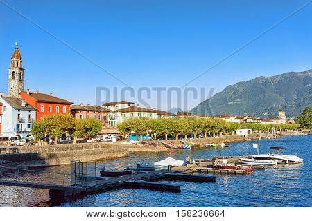 Church Tower And Colorful Architecture Of Ascona