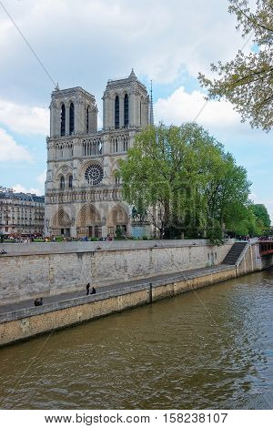 Dame De Paris Cathedral And Seine River Embankment