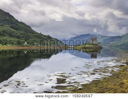 Eilean Donan Castle at Dornie on Kyle of Lochalsh in Scotland with a reflection