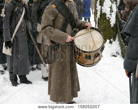 The drummer from the military band embos music.