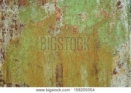 Old Rust Eroded Green Metal Sheet Decay Crumpled Iron Background. Weathered Iron Rusty Messy Wreck Isolated Texture. Corroded Iron Metal Structure. Abstract Aged Yellow Shabby Steel Sheet Surface.