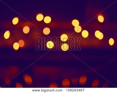 Abstract colorful blurry background cold and warm colors tone cinematic effect evening night street romantic lights