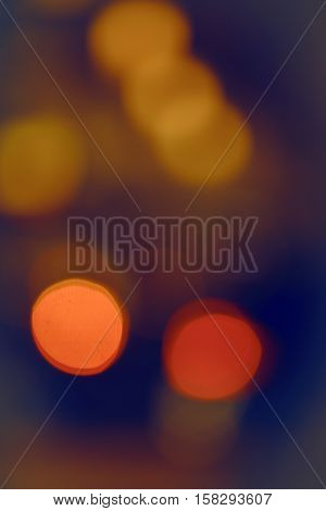 Abstract colorful blurry background cold and warm colors tone cinematic effect evening night street romantic lights