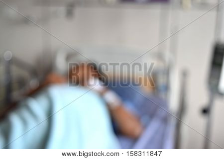 Patients sleep on the bed Hospital room and blur background.