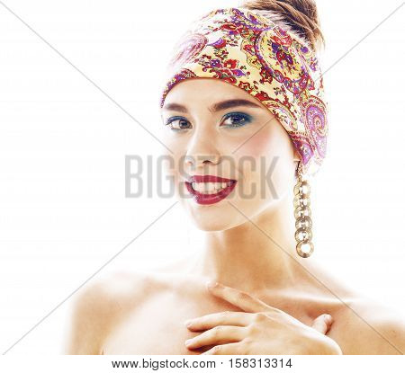 young pretty modern girl with bright shawl on head emotional posing isolated on white background, asian people ethnicity