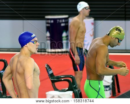 Hong Kong China - Oct 29 2016. Mitch LARKIN (AUS) and Omar PINZON (COL) at the start. FINA Swimming World Cup Preliminary Heats Victoria Park Swimming Pool.