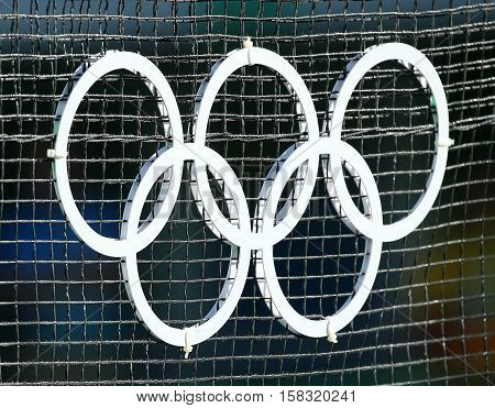 RIO DE JANEIRO, BRAZIL - AUGUST 13, 2016: Olympic rings at the main tennis venue Maria Esther Bueno Court of the Rio 2016 Olympic Games at the Olympic Tennis Centre