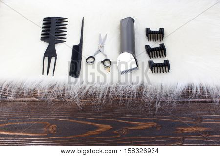 Hairdresser set with various accessories on background