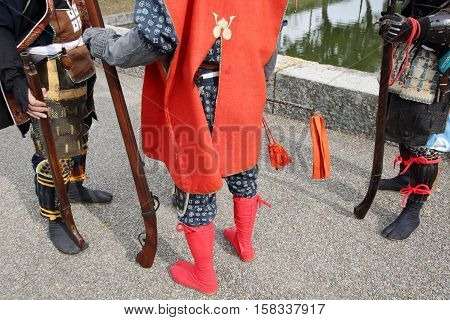 KAGAWA, JAPAN - NOVEMBER 20: Ancient firelock rifle fighters at Marugame Historical battle Festival, event dedicated to Japanese culture and tradition at Marugame-castle on November 20, 2016 in Japan.