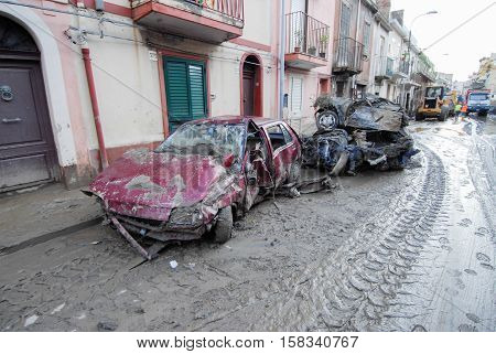 Scaletta Marina, Italy - October 3 2009. A landslide has invaded the Sicilian town causing many deaths. The collapse of a mountain caused hundreds of tons of earth and rock fell on buildings and cars.