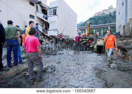 Scaletta Marina, Italy - October 3 2009. A landslide has invaded the Sicilian town causing many deaths. The collapse of a mountain caused hundreds of tons of earth and rock fell on buildings and cars.