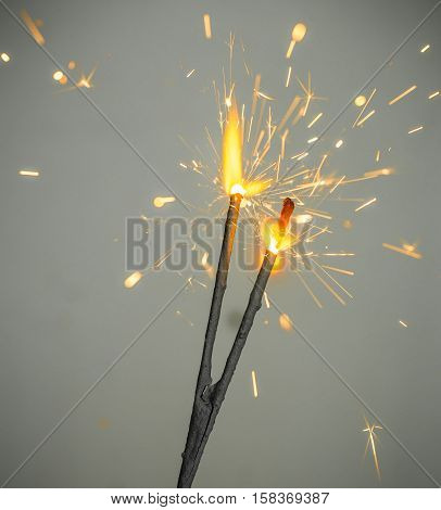 Sparklers holiday concept isolated on dark background