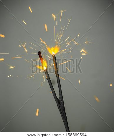 Sparklers holiday concept isolated on dark background