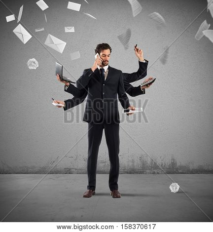 Businessman that to solve problems become multitasking with sheets and letters on background