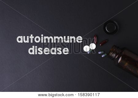 Autoimmune Disease Word With Medicine And Bottle - Health Concept. Medical Conceptual.