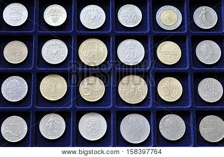old coins European states and blue pad