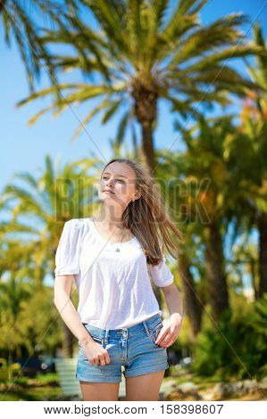 Girl Enjoying Her Vacation On A Tropical Resort