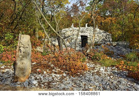 A World War One bunker in the Carso karst limestone area of Friuli Venezia Giulia near Aurisina Italy. The area was a major theatre of battle during the war and many remnants still remain today.