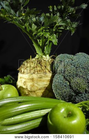 Green vegetables and fruits - celery apples celery root celeriac broccoli healthy diet concept
