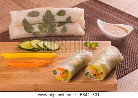 Traditional Japonese Vegetable Spring roll over a wooden table. Harumaki.