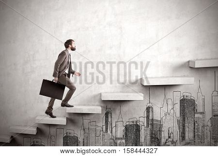 Side view of a man climbing the stairs built in a concrete wall. There is a city sketch under it. Concept of success and achieving your goal. Mock up