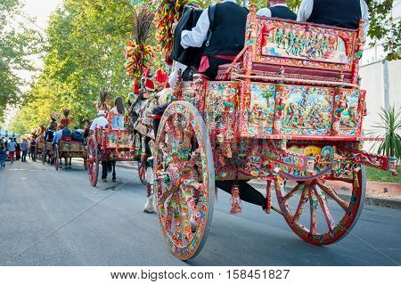 A typical colored sicilian cart during a folkloristic show