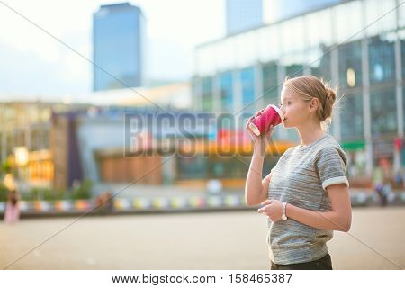Girl Walking At La Defense In Paris