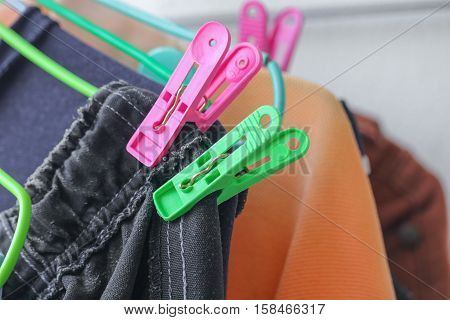 Plastic clothespin pin Close up and chintz drying on washing line
